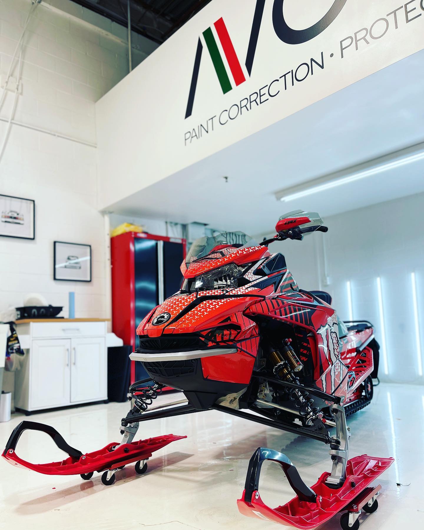 Ski-Doo after custom wrap, mirror-like clarity on the hood after leveling and polish