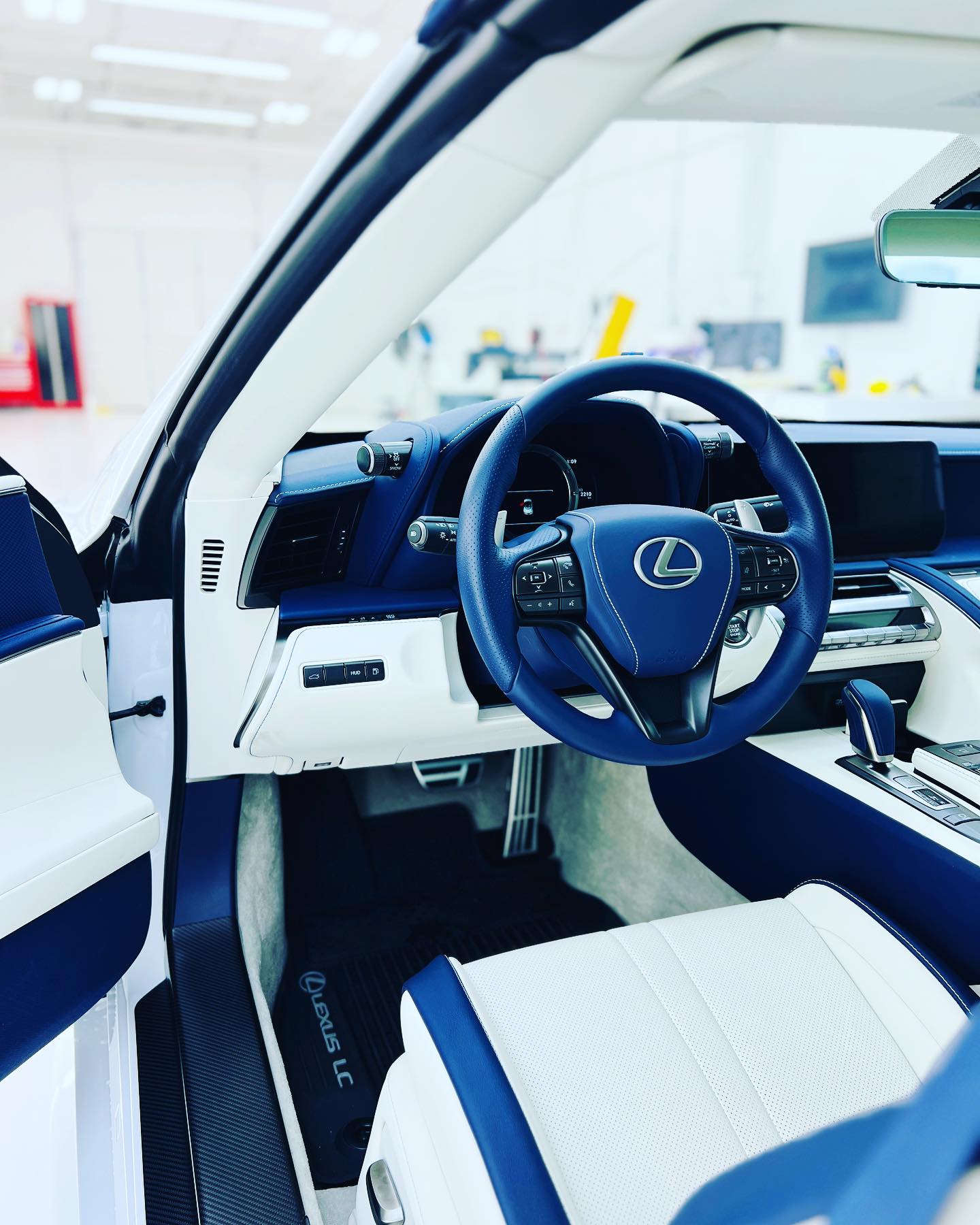 Lexus LC after interior detail, gloss reflection visible across the panels after final buff