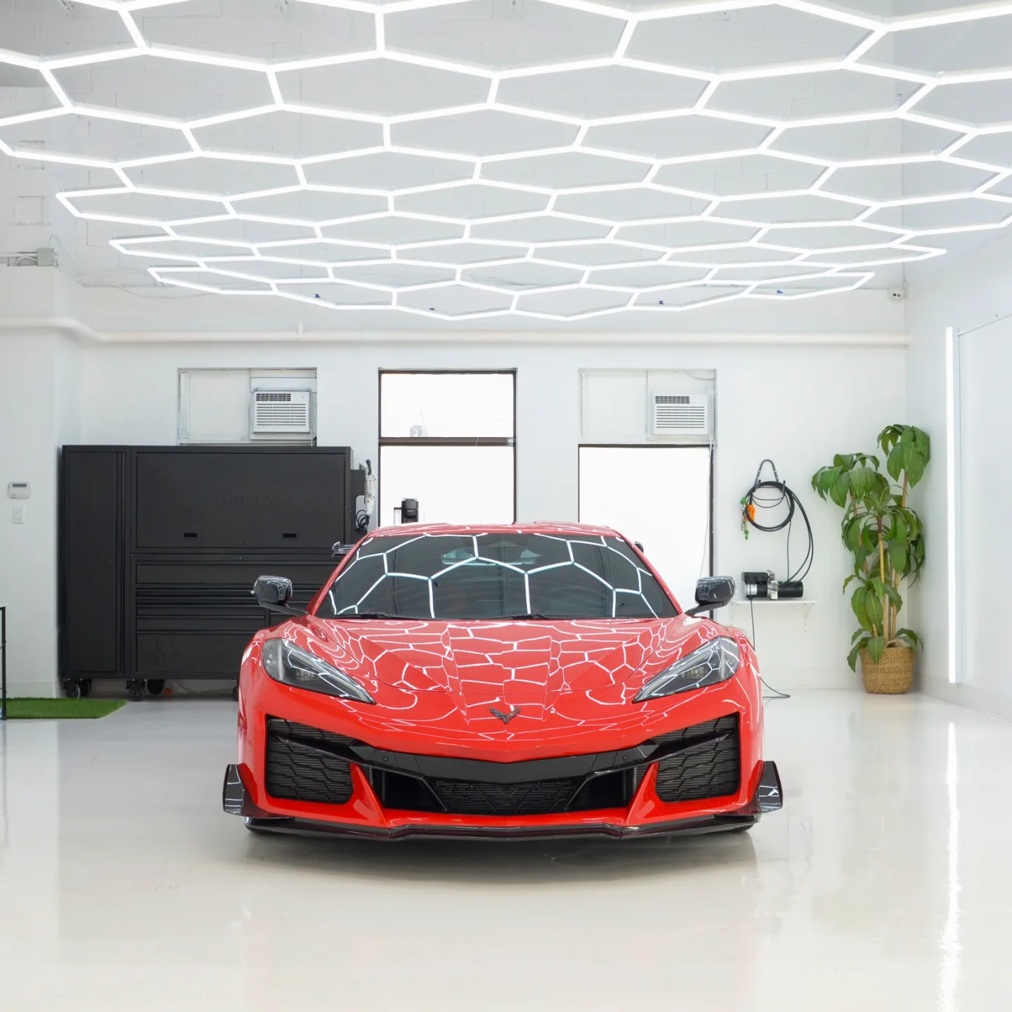 Corvette C8 Z06 after ceramic coating, sharp panel reflections showing corrected clear coat